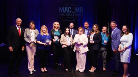 Winners of the Macomb Business Awards stand on stage