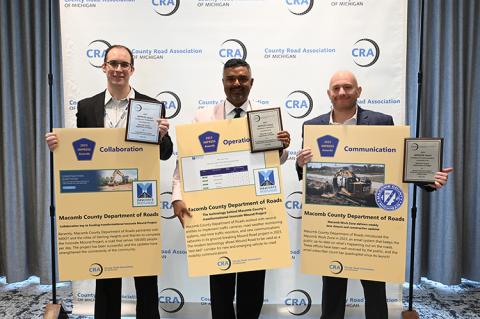 Left to right: Scott Wanagat, John Abraham, and Eric Dimoff accept CRA awards