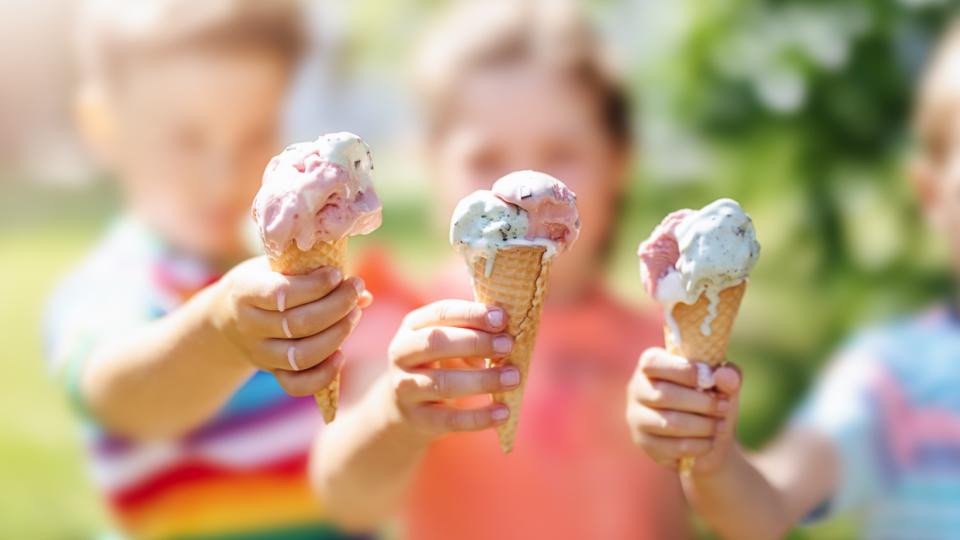 Children holding ice cream cones