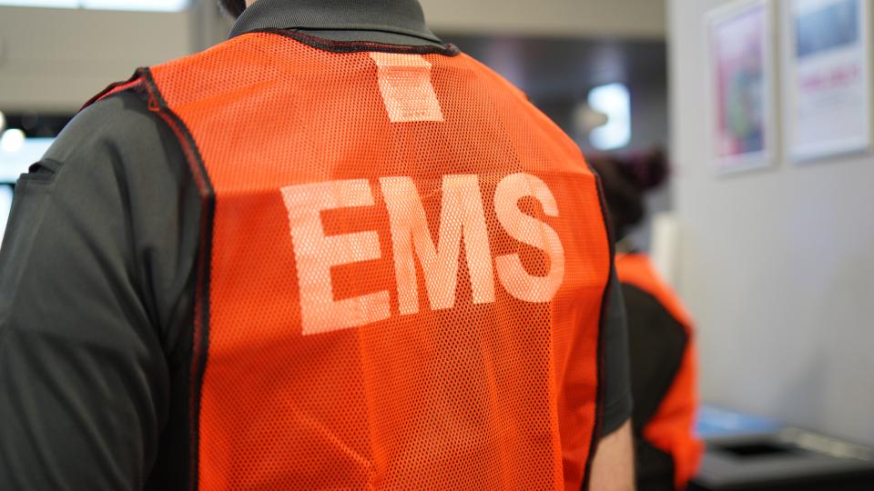 EMS worker standing