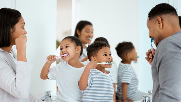 oral health family brushing teeth