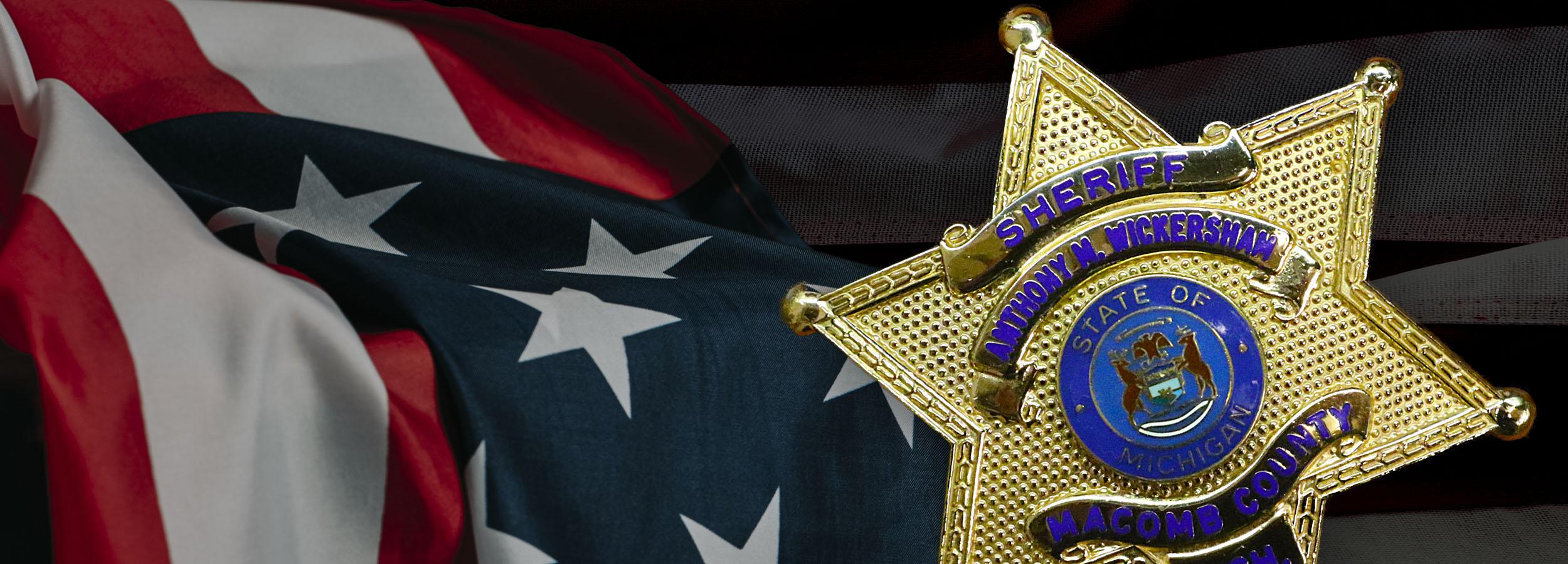 American flag with Sheriff badge
