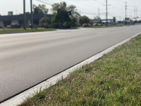 New pavement and clean roadside.